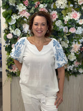 Load image into Gallery viewer, Umgee Embroidered blue abstract flower puff sleeve top
